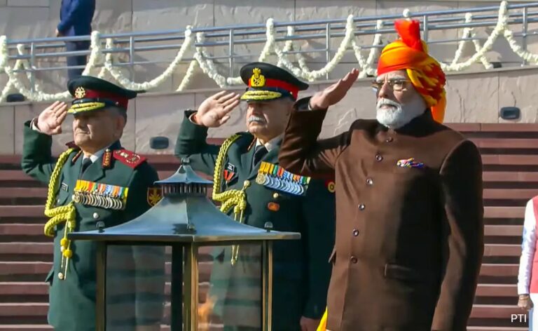 PM Modi Sports Vibrant Multi-Coloured Turban, Brown Coat On Republic Day
