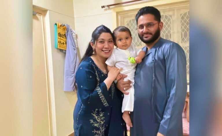 In Queue To Give Samples To Identify Crash Victims, 8-Month-Old In Uncle's Lap