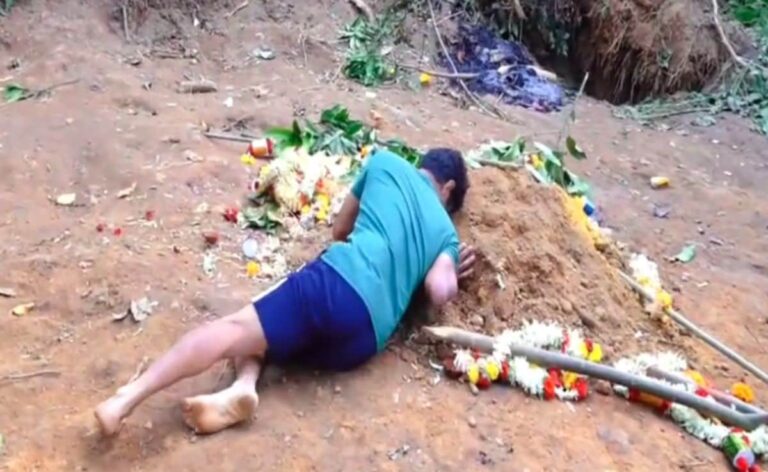 "I Want To Stay Here Too": Father Holds On To Grave Of Son Killed In Stampede